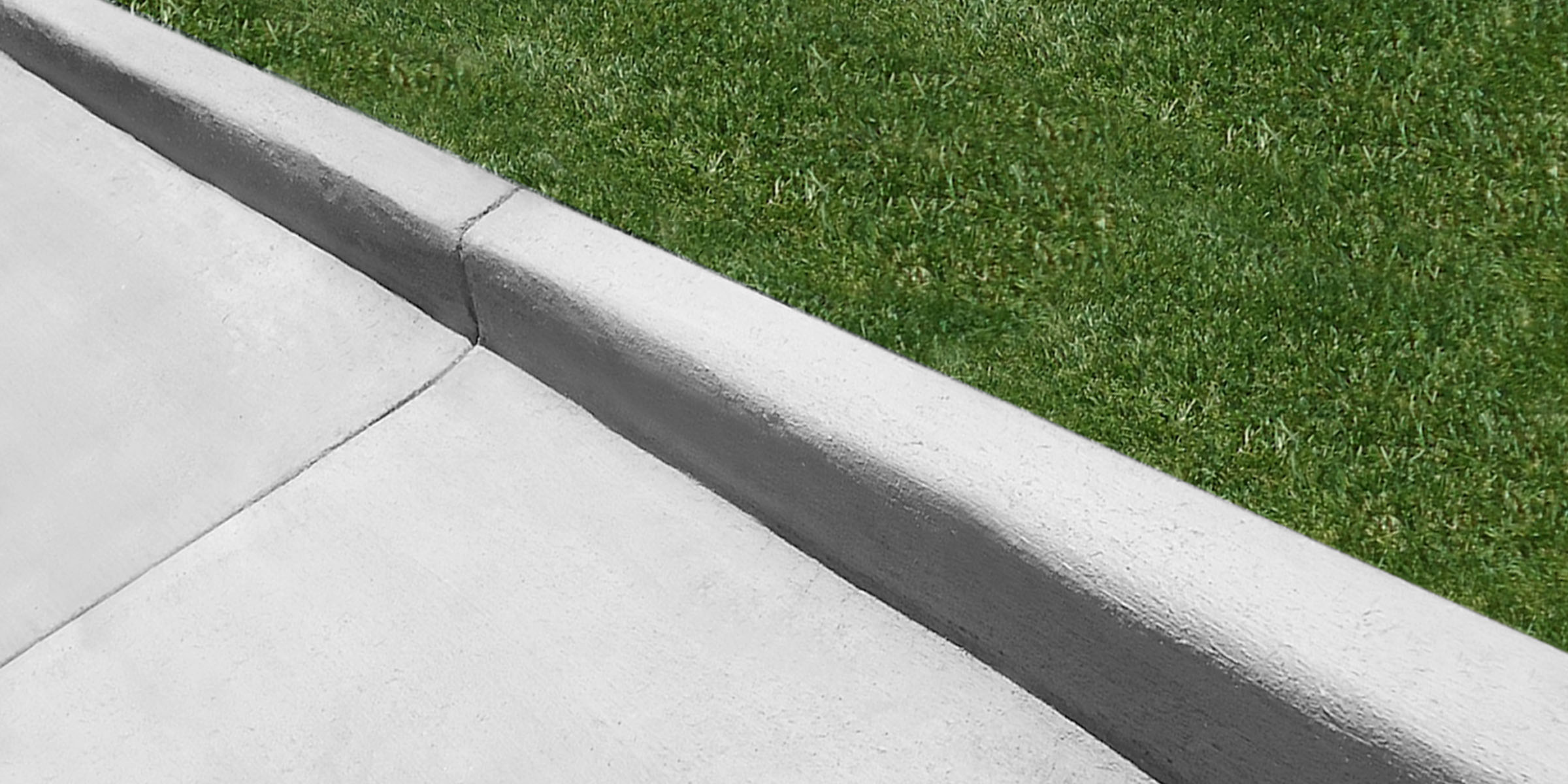 concrete-berm-angels-landscape-and-suburban-sidewalks