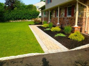 landscaping with pavers in front yard