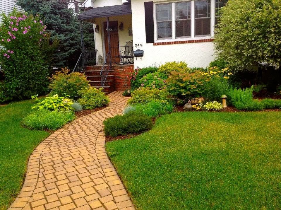 paver steps and landscaping in front of house
